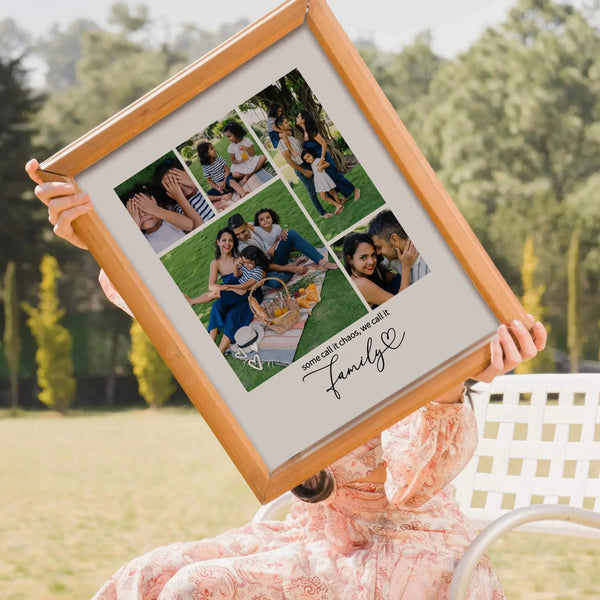 Woman holding framed family photo collage sitting outside