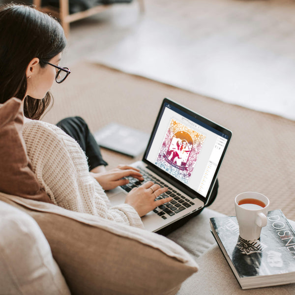 Woman editing floral pop art portrait template on laptop