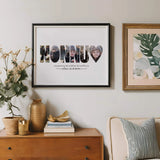 Nonnu Word Photo Collage in sleek black frame on white wall hung above a vintage bureau holding vases and books.