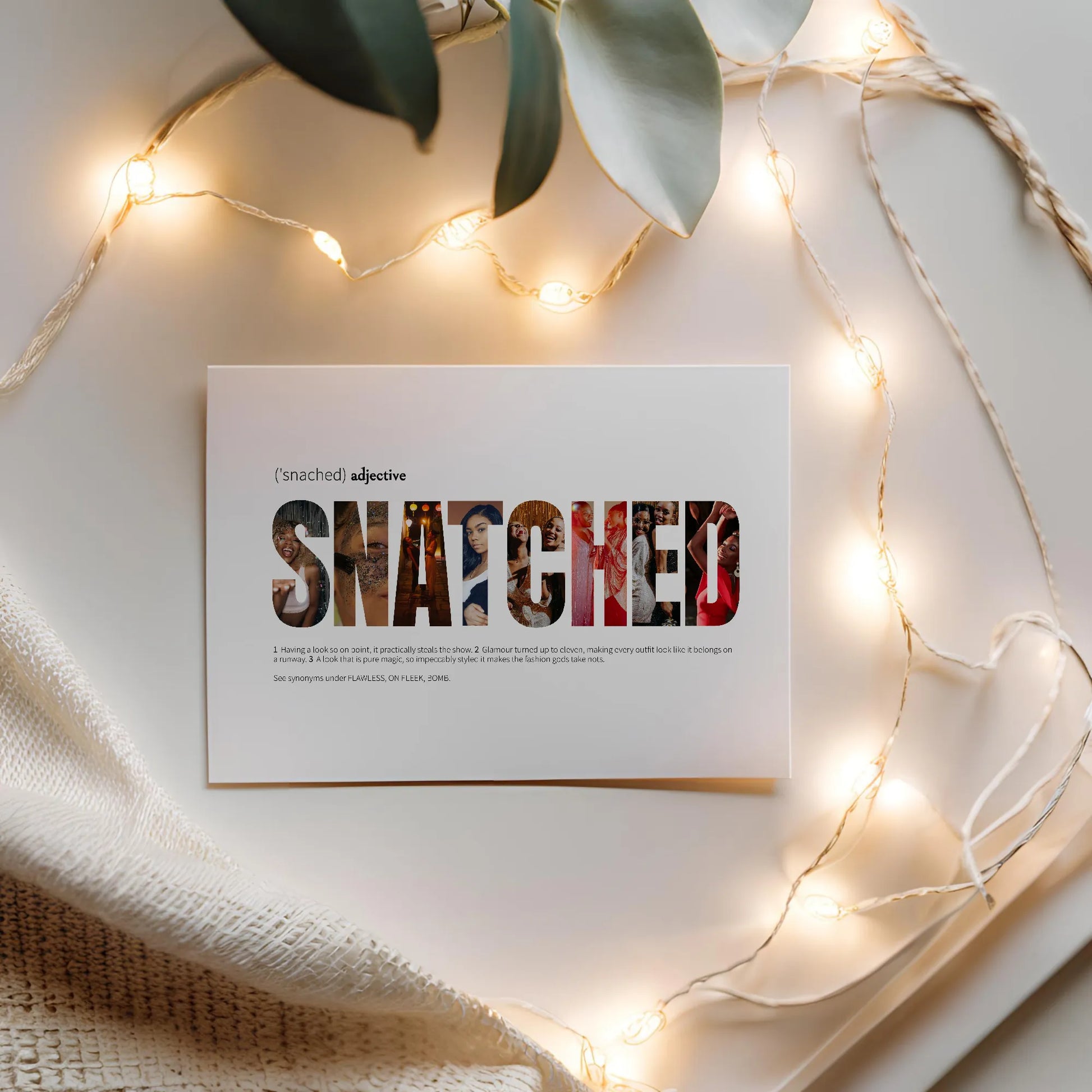 Snatched Word Art Collage on flat lay with string lights around