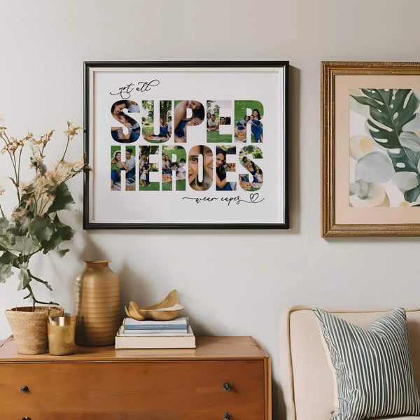 Not All Super Heroes Wear CapesPhoto Collage in a modern black frame hung on the wall above a vintage wooden bureau. On the bureau are a collection of vases and books.