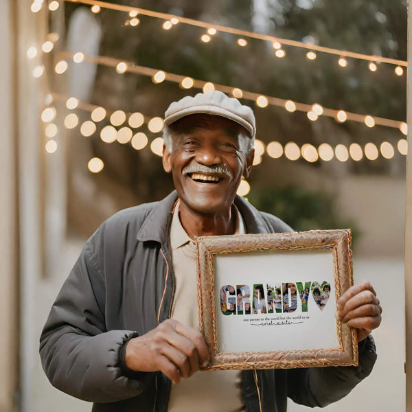 Older man wearing hat, holding grandy photo collage in frame, while standing outside with string lights in the background.